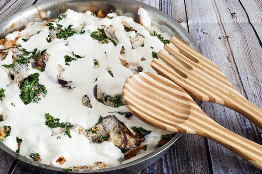 baked pasta with eggplant, bread and parmesan cheese