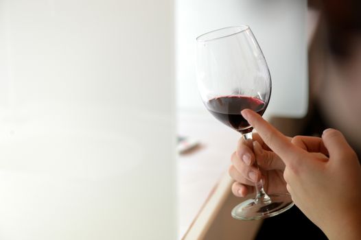 Tasting-White wine pour in a glass, bordeaux wineyard