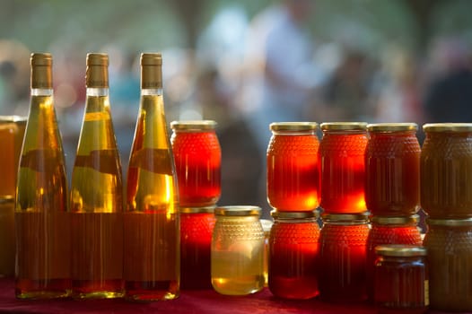 Honey and wine on a market stall, France