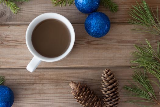 Christmas decorations, Christmas tree branches and cup of coffee