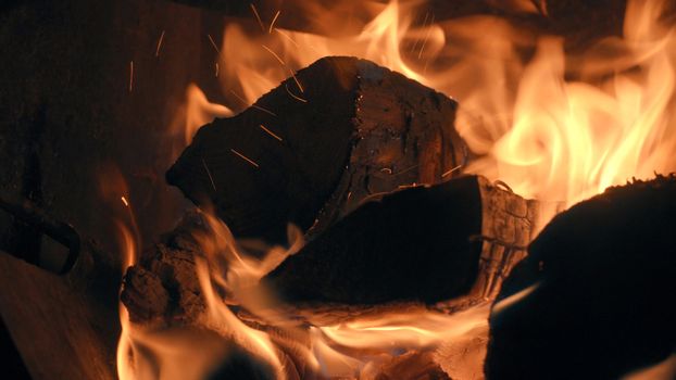 Wood burning in the stove. Fire close up.