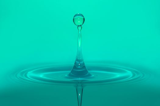 high speed green water droplets