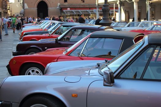Ferrara, Italia - September 24, 2016: The event "AutoMotoStoriche in Old Town" you can admire an exhibition of cars and motorcycles in the historic center of Ferrara. Different models of Porsche exposure