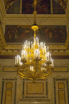 Old vintage chandelier hanging from the ceiling