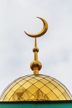 Golden dome and Moon of muslim temple in the Middle Volga