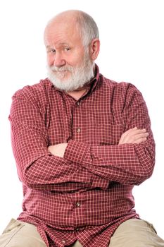 Cheerful and calm handsome bald and bearded senior man sitting with arms crossed, isolated on white background