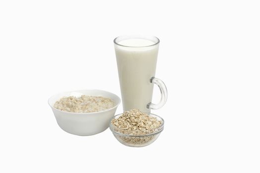 Bowl of oats porridge isolated on a white background Healthy breakfast