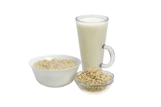 Bowl of oats porridge isolated on a white background Healthy breakfast