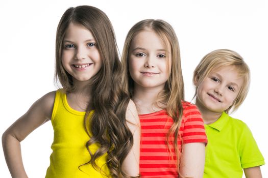 Three cheerful children isolated on white background