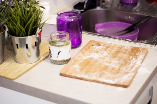 Flour on a wooden board on a kitchen