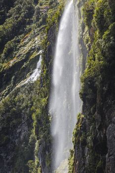 Incredible Stirling Falls with double rainbow, Milford Sound, Fiordland, South Island, New Zealand

