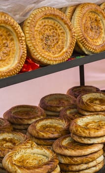 Kirghiz bread tokoch on Sunday market in Osh. Kyrgyzstan.