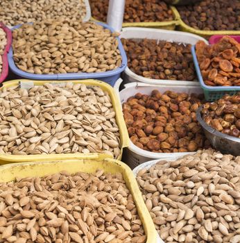 Spices and vegetables in bags at local bazaar in Osh. Kyrgyzstan.