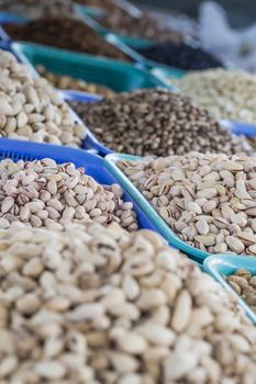 Osh bazaar in Kyrgyzstan - nuts and raisins for sale.