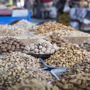 Spices and vegetables in bags at local bazaar in Osh. Kyrgyzstan.