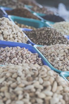 Spices and vegetables in bags at local bazaar in Osh. Kyrgyzstan.