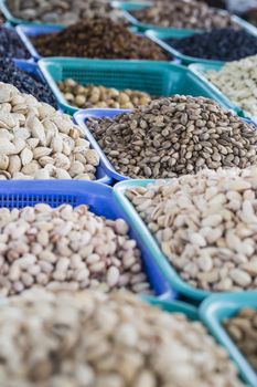 Osh bazaar in Kyrgyzstan - nuts and raisins for sale.