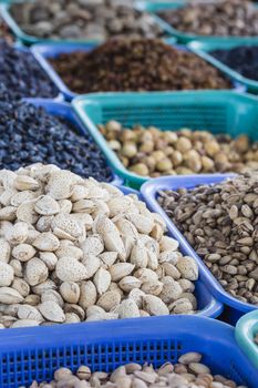 Osh bazaar in Kyrgyzstan - nuts and raisins for sale.