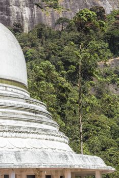 White Stupa sacred mountain Adam's Peak in Sri Lanka

