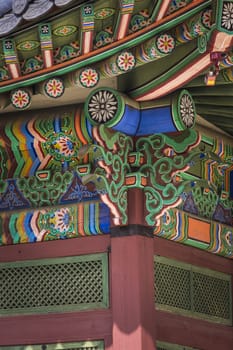 Detail of Traditional Korean Roof, Colourful Decorated Ornament for Ancient Korean Palace or Temple at Seoul, South Korea.