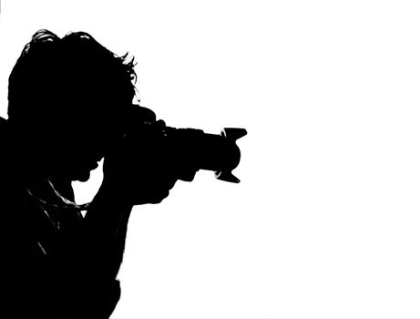 black and white silhouette side view of photographer
