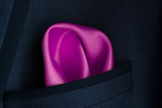 lose up of a Purple handkerchief in a jacket pocket