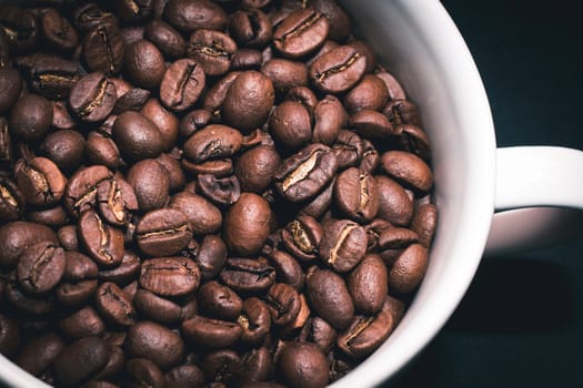 close up Coffee beans in white cup