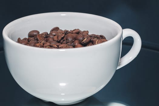 close up Coffee beans in white cup