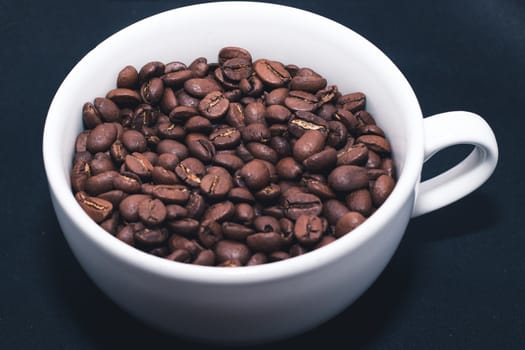 close up Coffee beans in white cup