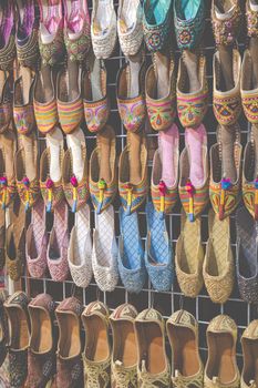 Rows of typically oriental shoes at the market in Dubai