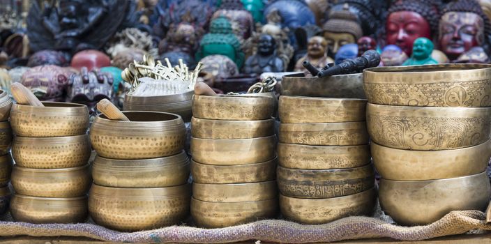 Several singing bowls displayed at a market in Kathmandu, Nepal