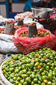 The street vendor sels his fruits and vegetables in Thamel in Kathmandu, Nepal.