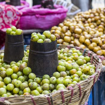 The street vendor sels his fruits and vegetables in Thamel in Kathmandu, Nepal.