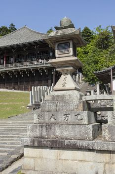 Bottom of steps entering Nigatsu-do Hall on the Todai-ji temple complex on an overcast day in Nara, Japan

