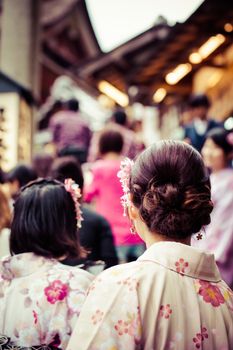 Japanese women wear a traditional dress called Kimono for Sakura viewing at Kiyomizu temple in Kyoto