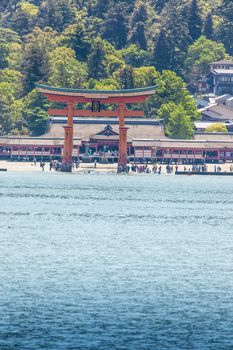 Miyajima, Famous big Shinto torii standing in the ocean in Hiroshima, Japan 