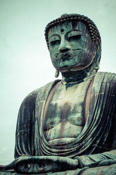 The Great Buddha (Daibutsu) on the grounds of Kotokuin Temple in Kamakura, Japan. 