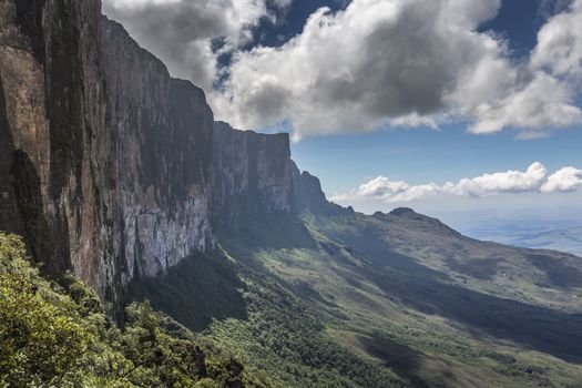 Trail down from the plateau Roraima passes under a falls - Venezuela, South America

