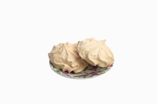 Fresh delicious meringue cookies served with tea or coffee macro