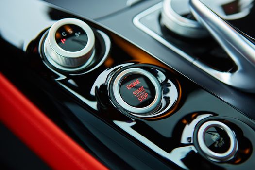 Start stop engine modern new car button.