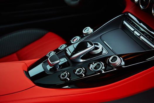 Detail of modern car interior, gear stick, automatic transmission in expensive car