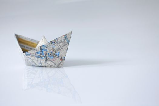 right course, paper boat, road map on board, open infinite space, freedom navigation