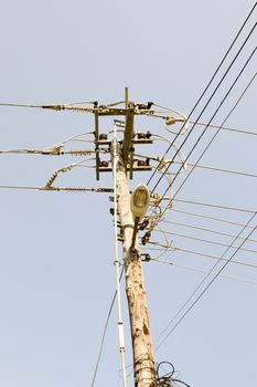 Electric pole with cables and street lighting