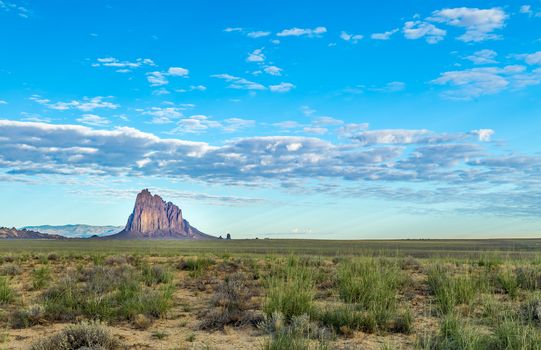Shiprock (Navajo: Tsé Bitʼaʼí, "rock with wings" or "winged rock" is a monadnock rising nearly 1,583 feet (482.5 m) above the high-desert plain of the Navajo Nation in San Juan County, New Mexico, United States. Its peak elevation is 7,177 feet.