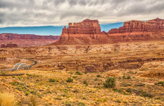 The Hite Crossing Bridge is an arch bridge which carries Utah State Route 95 across the Colorado River northwest of Blanding, Utah. The bridge informally marks the upstream limit of Lake Powell and the end of Cataract Canyon of the Colorado River.