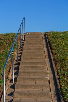 Stairs on the dike at Zons on the Rhine river in Germany.