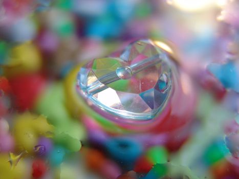 water drops on multicolor background.glass heart