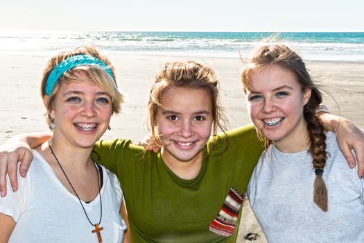 Three Beautiful Girls Together at the Beach