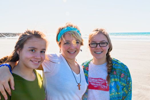 Three Beautiful Girls Together at the Beach