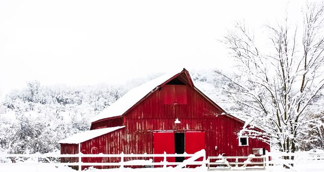 Big Red Barn in the Winter Snow
